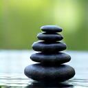 Person meditating calmly in a serene garden